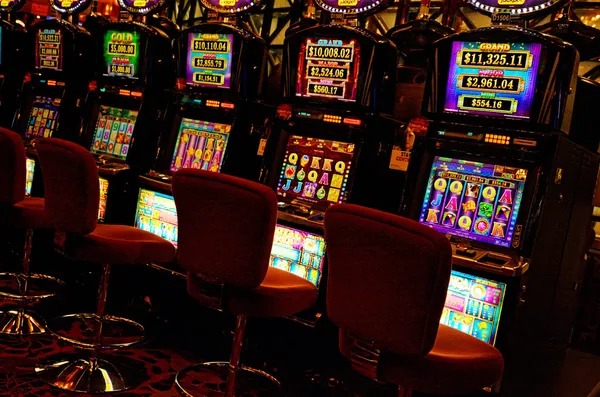 Game rules reference card showing blackjack, roulette, and baccarat payout structures